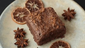 Chocolate brownie cake, food, sweet dessert with nuts rectangular shape. A slice of sweet chocolate brownie for the dinner table - Powered by Shutterstock - Get 15% off with code: PIKWIZARD15