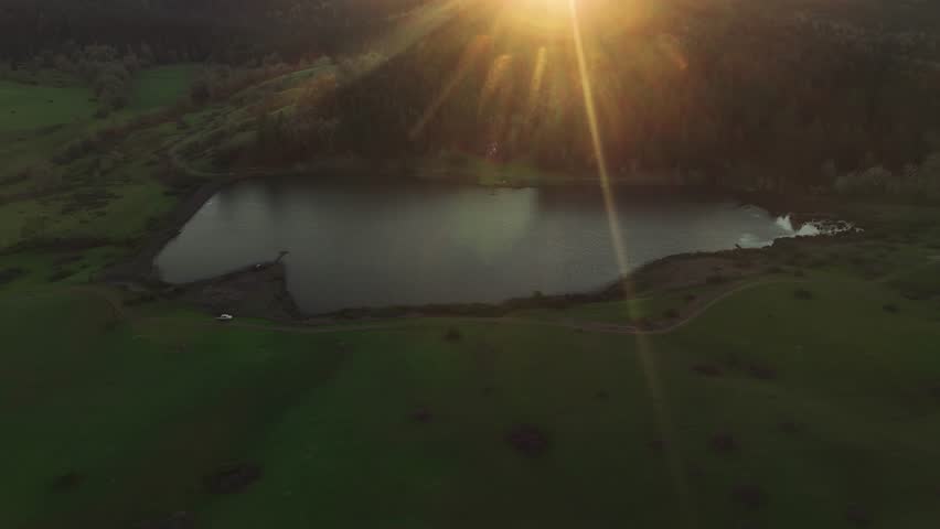Aerial drone view of village with lake and fields at sunset, Oregon USA