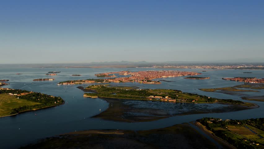 Golden Hour Aerial View of Venice and Surrounding Islands from Distance