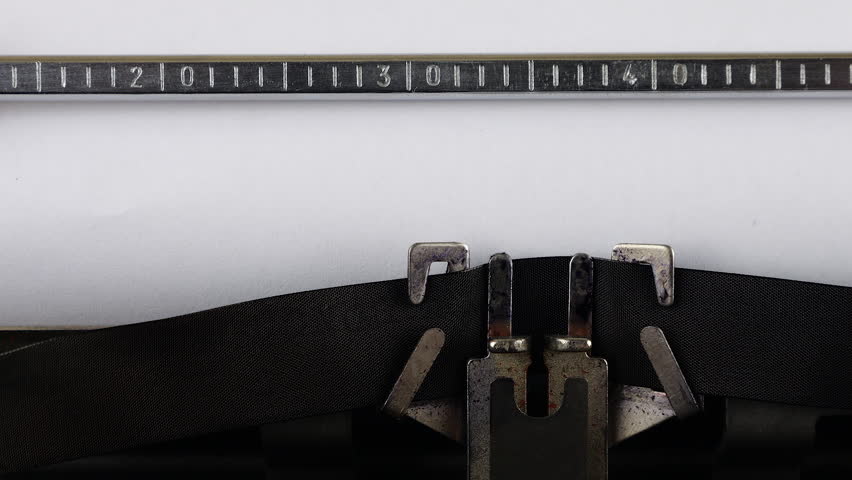 The phrase TRADE TARIFFS is typing on a retro typewriter.