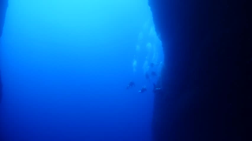scuba divers are exploring and enjoying the caves underwater cave dive