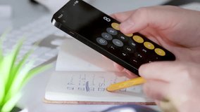 Smartphone with calculator app open, used for finance, business planning, and daily calculations. - Powered by Shutterstock - Get 15% off with code: PIKWIZARD15