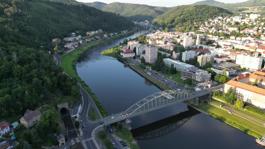 Aerial drone footage of Decin Castle and the Elbe River in the Czech Republic, showcasing historic architecture, scenic landscapes, and a picturesque travel destination.