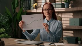 Businesswoman Caucasian girl business woman employer office trader investor holding paper document chart economical graph crypto invest finance report sales growth gain income profit credit bank loan - Powered by Shutterstock - Get 15% off with code: PIKWIZARD15