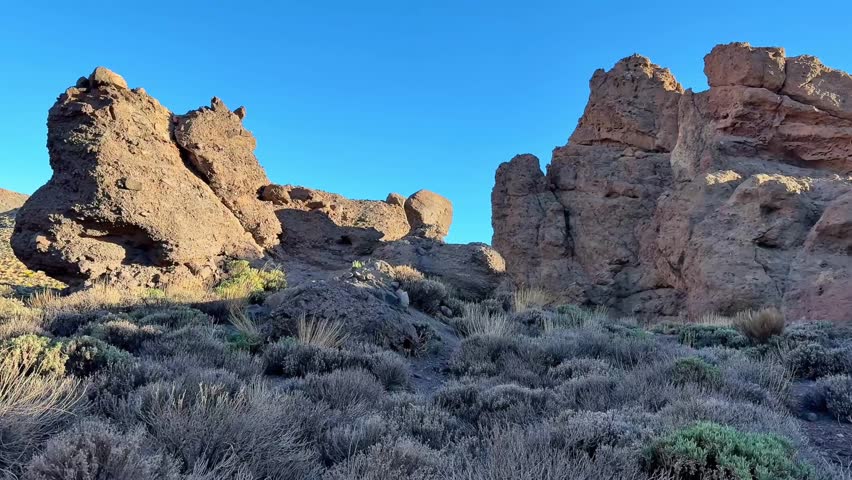 The stunning views of rugged rock formations in a serene landscape showcase natures remarkable beauty