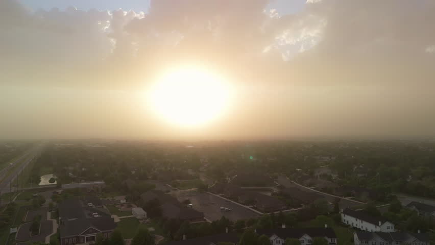 Drone Aerial shot view of Sandstorm dust Covers town and suburbs