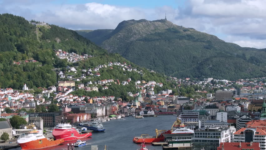Aerial drone footage of Bergen, Norway, with the historic Bryggen wharf and harbor in view