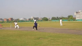Cricket Batsman Persistently practice their hitting skills to improve their overall proficiency in the sport game, during cricket game - Powered by Shutterstock - Get 15% off with code: PIKWIZARD15