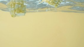 Fresh Corn Cobs Immersed in Water With Bubbling Effect Slow Motion. - Powered by Shutterstock - Get 15% off with code: PIKWIZARD15
