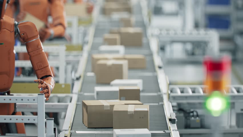 Close-up: Packages on Conveyor are Being Sorted and Moved by Autonomous AI-Enabled Humanoid Robot at Fulfillment Center. Automated Warehouse or Distribution Center with Advanced General Purpose Robots
