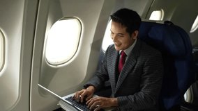Airplane, travel and portrait of businessman working on laptop computer and smartphone, Tablet while sitting in airplane. - Powered by Shutterstock - Get 15% off with code: PIKWIZARD15