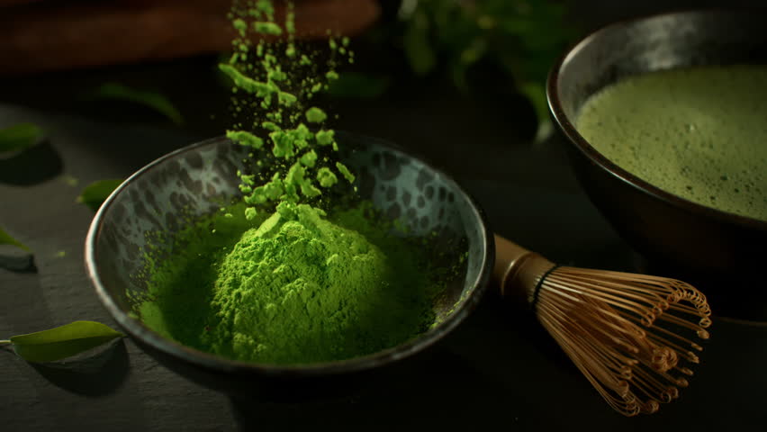 Super Slow Motion Shot of Falling Matcha Powder into a Bowl with Camera Motion at 1000fps.
