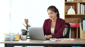 Young Asian woman doing financial accounting and taxes for a company Organizing account analysis reports Investment information Financial and tax system concepts - Powered by Shutterstock - Get 15% off with code: PIKWIZARD15
