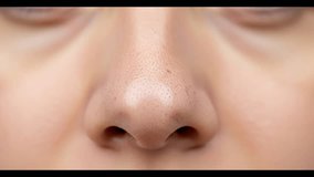 Close-Up of Woman’s Nose with Blackheads and Skin Pores – Dermatology and Cosmetology Concept in High-Quality 4K Video
 - Powered by Shutterstock - Get 15% off with code: PIKWIZARD15