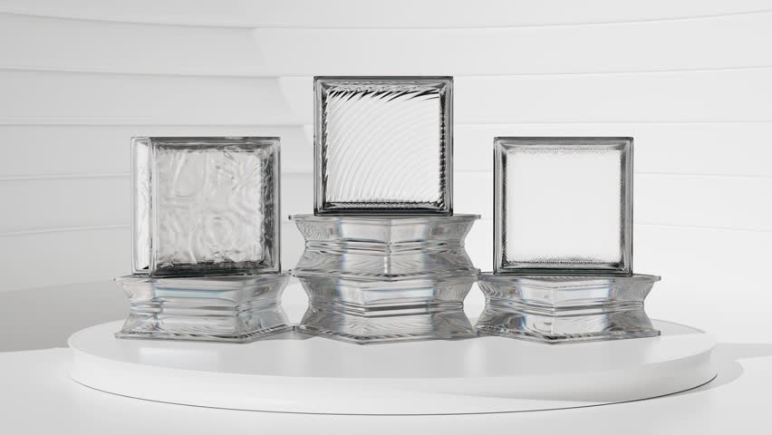 Glass bricks rotating on a moving platform on a white background.