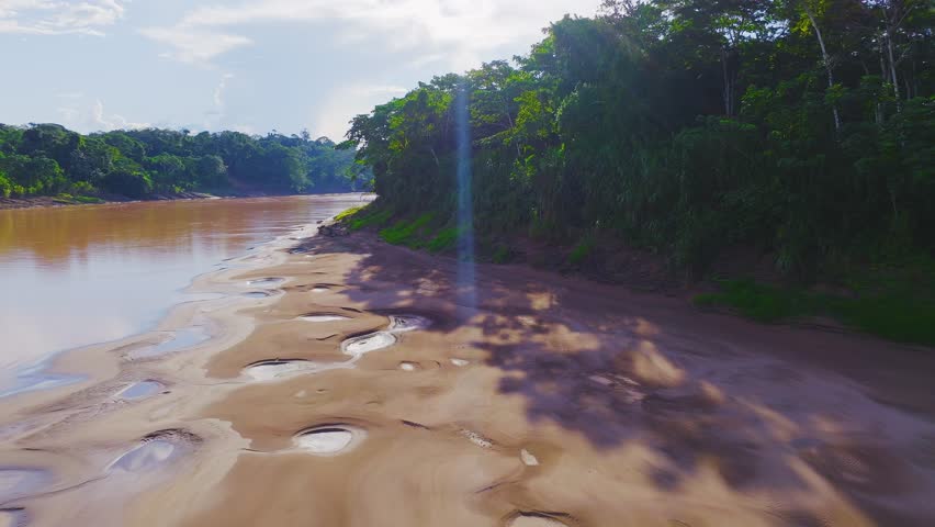 Tambopata Riverbank with Sandbank Pools and Amazon Rainforest in Peru, Aerial View