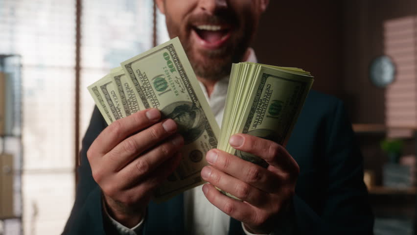 Close up male hands holding dollars excited Caucasian office businessman say wow counting cash cropped view closeup business man hold money financial success celebrate investment income achievement