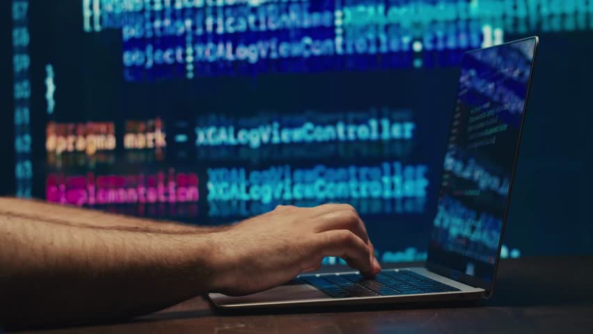 Man work with chatbot AI online, connecting with AI and using a chat bot. IT engineer software developer programmer interact with chat bot, making writing code. Typing on laptop keyboard close-up. 