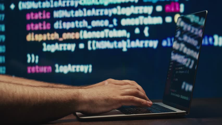 Man work with chatbot AI online, connecting with AI and using a chat bot. IT engineer software developer programmer interact with chat bot, making writing code. Typing on laptop keyboard close-up. 