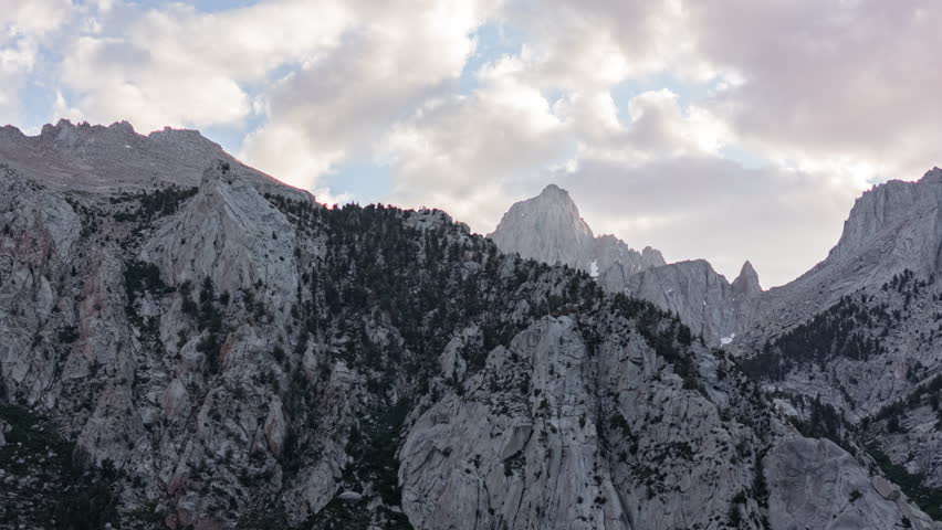 Aerial hyperlapse of Mount Whitney at sunset in Sierra Nevada Mountains, California