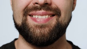 Smiling man portrait, Close up head shot portrait of middle aged bearded male with healthy white toothy smile looking at camera. - Powered by Shutterstock - Get 15% off with code: PIKWIZARD15
