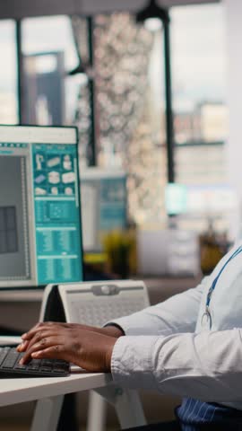 Smiling engineer in office pleased after developing innovative solar powered device design. Happy RD department expert satisfied with solar gadget environmental conservation efficiency, camera B