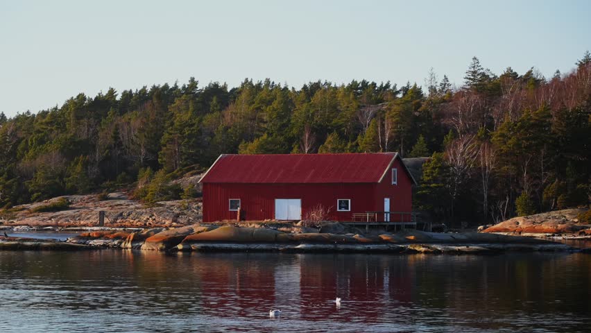 Sandefjord Nötholmens Naturreservat Strömstad Marina Red building seagull birds coastal seaside town Stromstad Sweden Sverige ferry boat ride Norge Scandinavia arctic golden hour sunset coastline