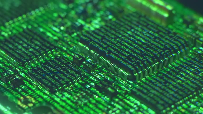 Lines of program code moves on a microchips in a circuit board, symbolizing the operation of an electronic device. Closeup. Macro. Follow focus. Shallow depth of field - Powered by Shutterstock - Get 15% off with code: PIKWIZARD15