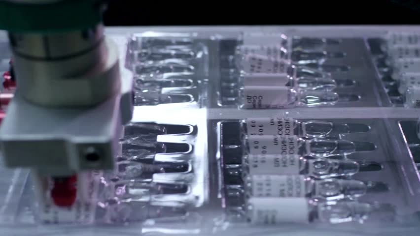 This segment showcases sterile vials arranged systematically, emphasizing their role in the pharmaceutical industry.
