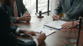 Negotiation meeting among legal professionals office setting business discussion indoor environment close-up view - Powered by Shutterstock - Get 15% off with code: PIKWIZARD15