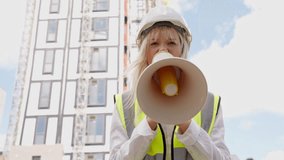 Construction manager directs team at urban building site during bright day - Powered by Shutterstock - Get 15% off with code: PIKWIZARD15