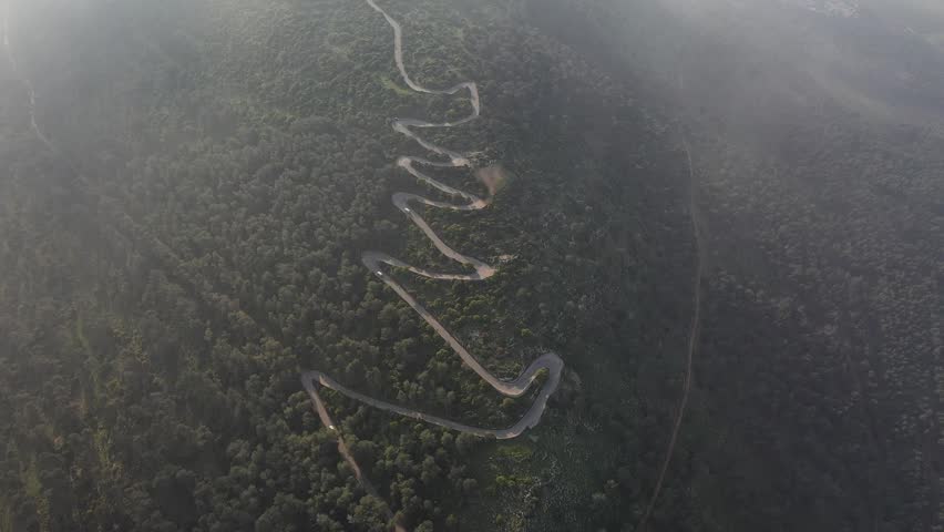 The winding road that leads to the summit of Mount Tabor in Israel from a drone