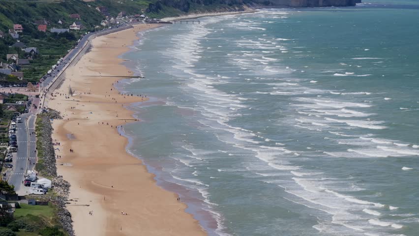 Aerial view of Omaha Beach - D-Day Landing site for World War 2 in Normandy France - American War Memorial and Cemetery	