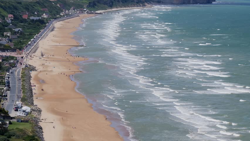 Aerial view of Omaha Beach - D-Day Landing site for World War 2 in Normandy France - American War Memorial and Cemetery	