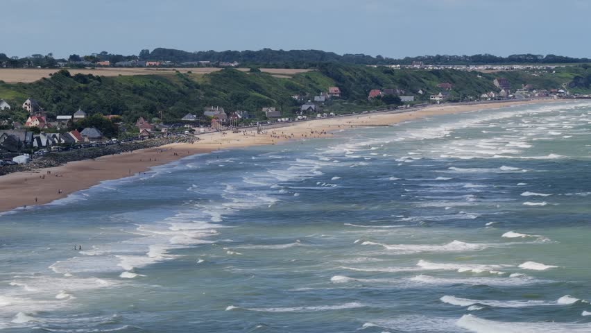 Aerial view of Omaha Beach - D-Day Landing site for World War 2 in Normandy France - American War Memorial and Cemetery	