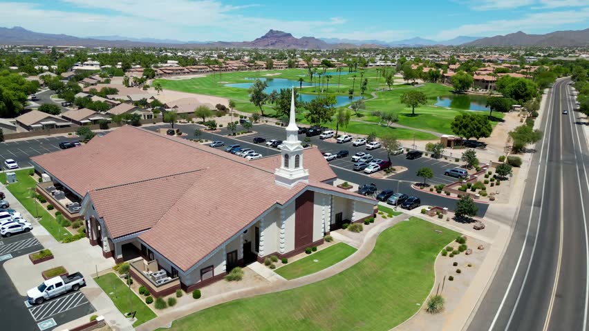 An Aerial view of the Church of Jesus Christ of Latter-day Saints with a parking lot in Mesa, Arizona