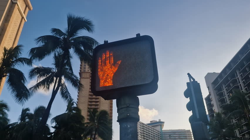 Pedestrian Stop Sign Light, Red Palm Hand. Honolulu, Hawaii USA
