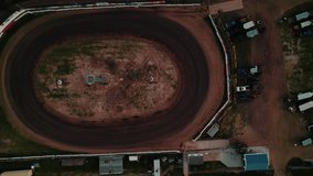 Top-down drone view of a dirt oval, home to local go-kart racing. A symbol of grassroots motorsports and American rural entertainment. - Powered by Shutterstock - Get 15% off with code: PIKWIZARD15