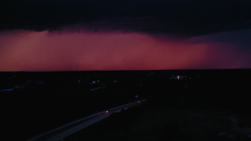 A singular, powerful lightning bolt strikes from a tumultuous sky. Perfect for themes of creation, judgment, or the apocalypse.