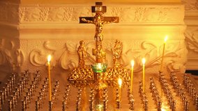 Altar candle glowing with warm candlelight, symbolizing faith, prayer, remembrance, spiritual peace. Perfect for use in religious ceremonies, meditation visuals, holiday celebrations, memorial design. - Powered by Shutterstock - Get 15% off with code: PIKWIZARD15