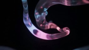 Abstract background of a futuristic, flowing, iridescent liquid gel with luminous pink and purple tones. - Powered by Shutterstock - Get 15% off with code: PIKWIZARD15