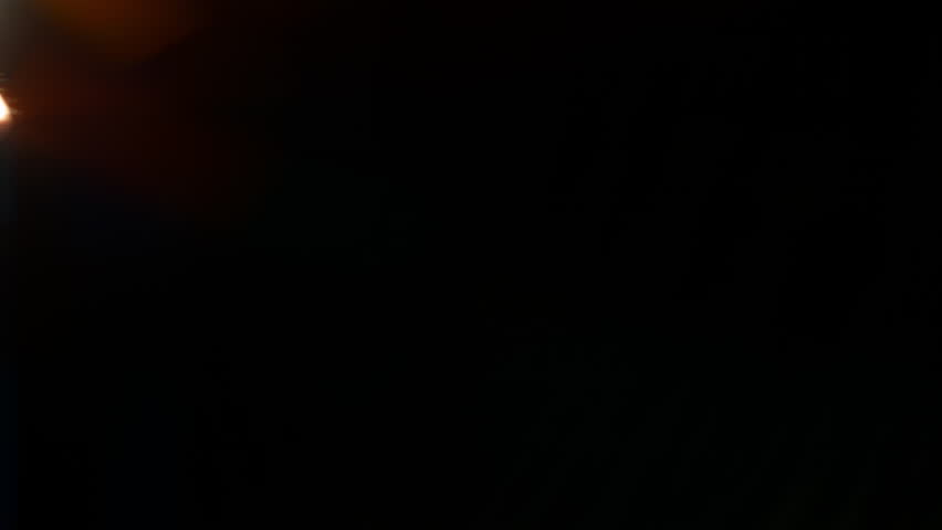 Real Shooted Cinematic Lens Flare Overlay on Black Background at 1000fps Slow Motion.