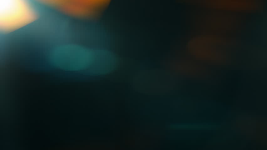 Real Shooted Cinematic Lens Flare Overlay on Black Background at 1000fps Slow Motion.