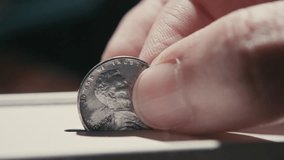 Insert the Lincoln cent coin into a money savings box - Powered by Shutterstock - Get 15% off with code: PIKWIZARD15