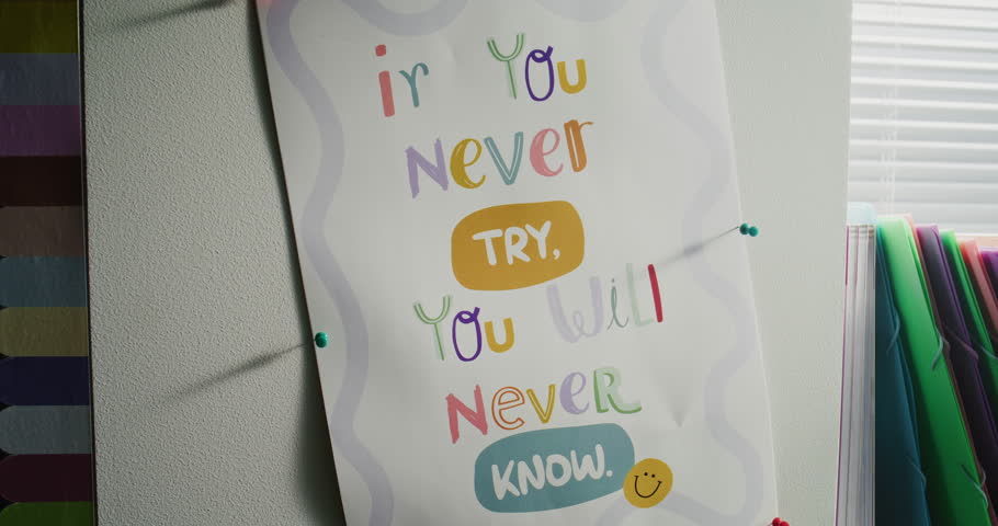 Colorful Poster with Motivational Quote Hanging on the Wall in Modern Primary School Classroom. Creative Space for Children Studying and Education, Development of Imagination and Creativity. Close Up.