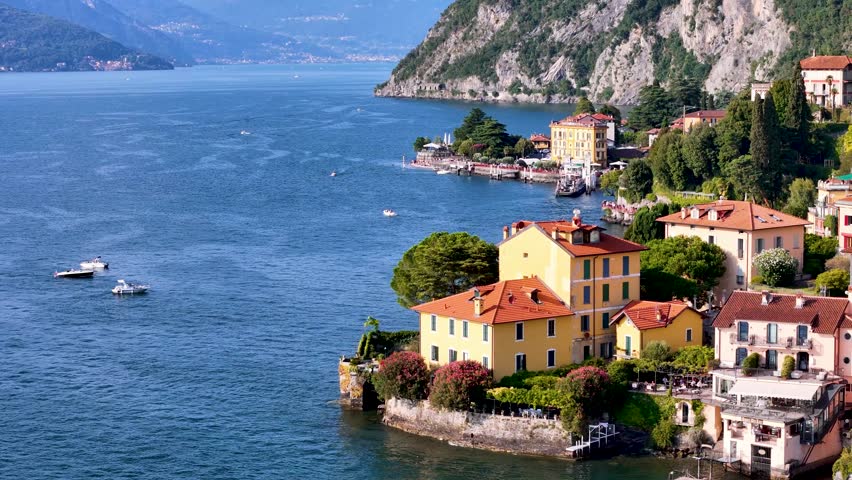 Como lake, Lombardy, Italy. Aerial panoramic 4K drone video footage of picturesque lake view. Scenic panorama