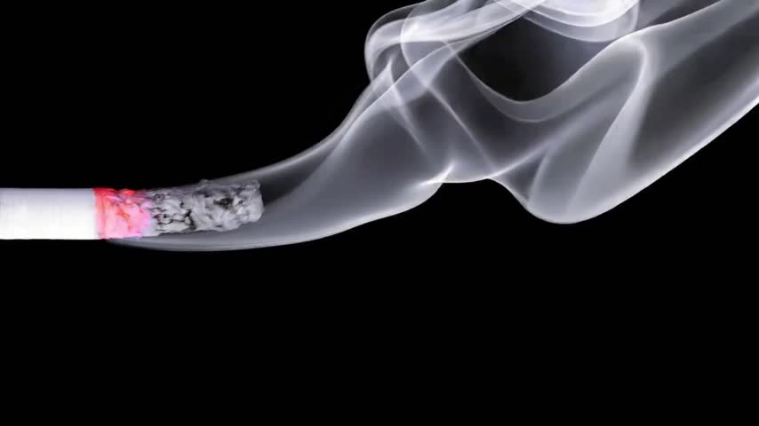 Cigarette smoking closeup isolated on balck background, cigarette footage