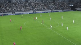 Soccer Football Championship Stadium with Crowd of Fans: Red Team Attacks, Scores Goal, Players Celebrate Tournament Victory. Sport Channel Broadcast Television Playback. High Angle Footage - Powered by Shutterstock - Get 15% off with code: PIKWIZARD15