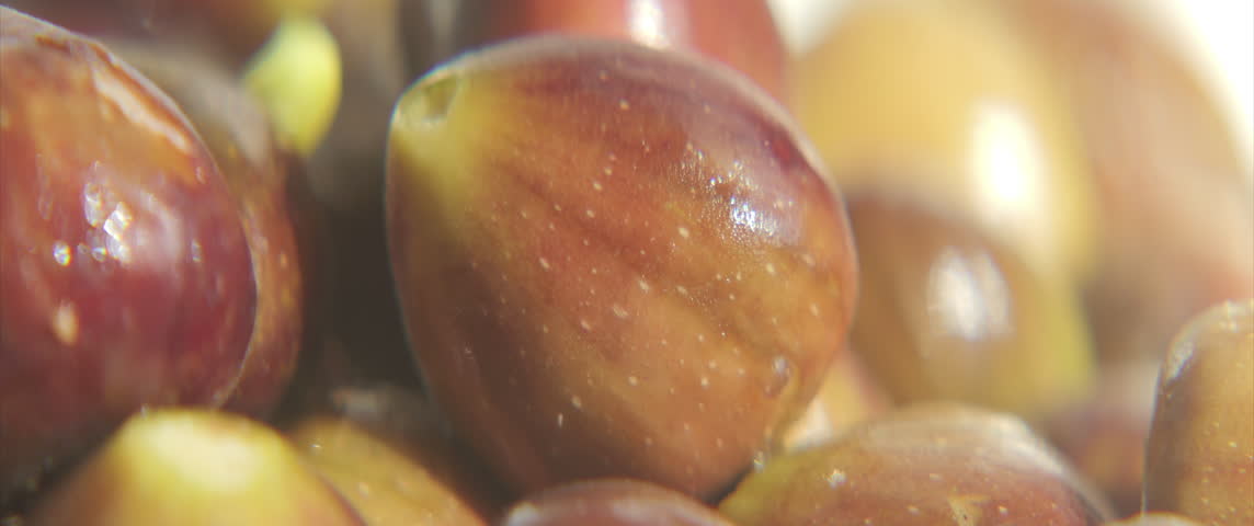 Tasty Ficus carica fruit pile anamorphic 4K sliding video