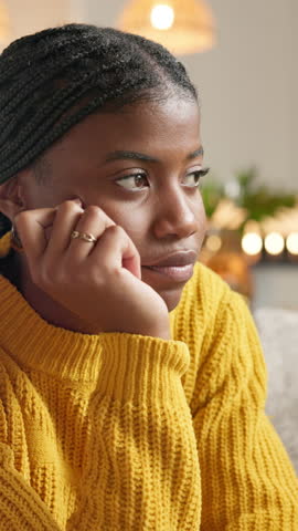 Thinking, African woman and bored at house with fatigue, weekend reflection and daydreaming. Female person, thoughts and mental health for overthinking, remember past and laziness for problem solving